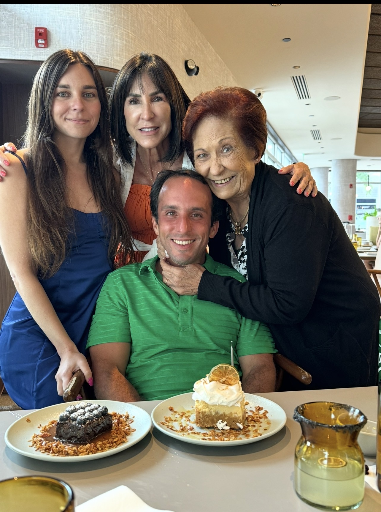Lynn surrounded by her family