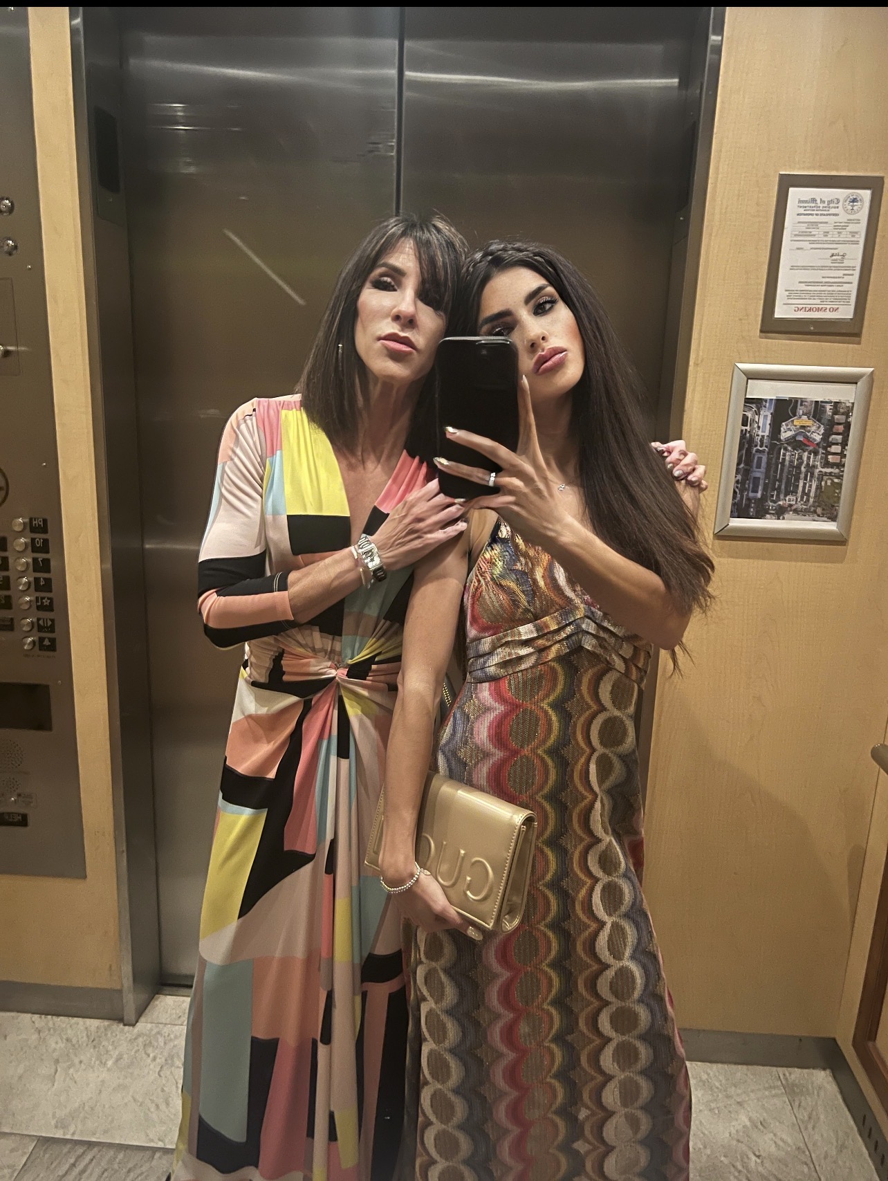 Mother and daughter, dressed up